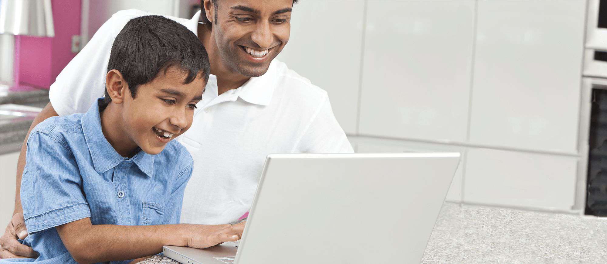 Young student working with teacher on electronic project